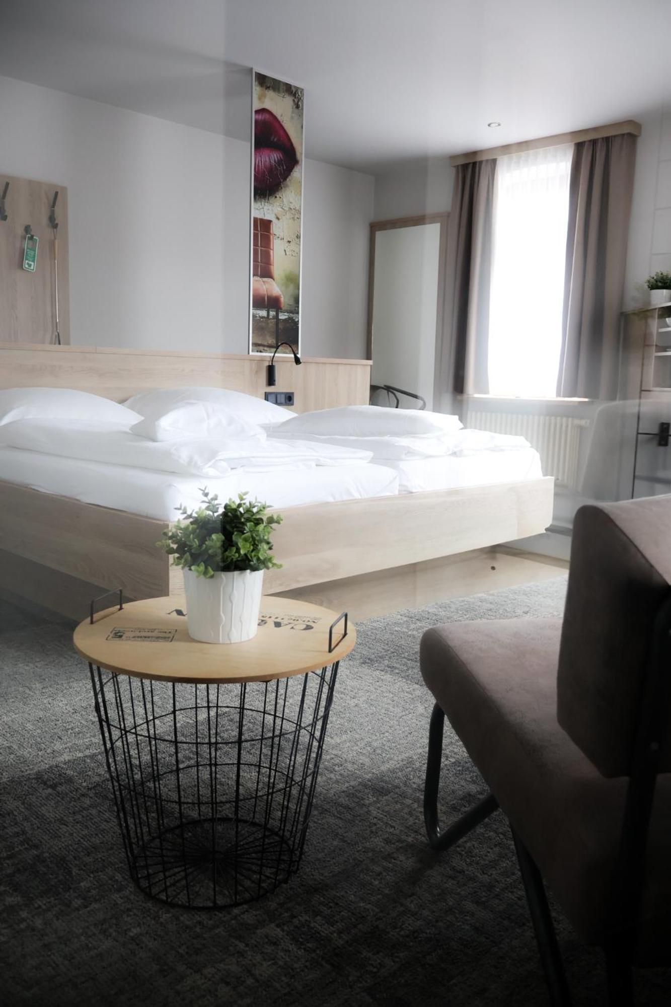 Alexxanders Hotel & Boardinghouse, Restaurant Хемніц Номер фото